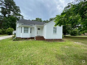 Building Photo - Introducing a charming 2-bedroom, 2-bathro...