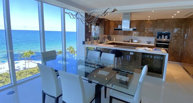 Building Photo - 10275 Collins Ave