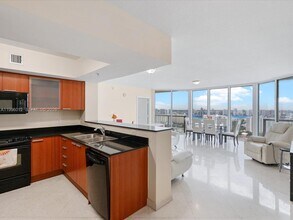 Building Photo - 16699 Collins Ave