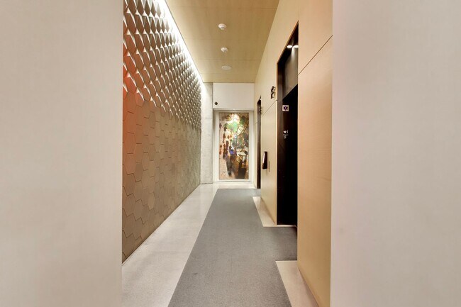 Building Photo - Urban Luxury at SoMa Serif Condos 2BR/2BA | In-Unit Laundry & 24-Hour Security