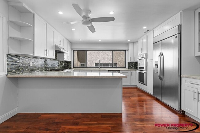 Building Photo - Spacious 5-Bedroom Home with Modern Amenit...