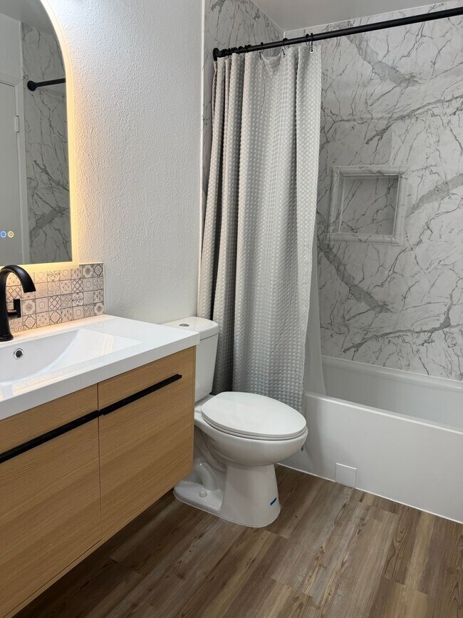 Building Photo - Beautifully remodeled 2-Bedroom, 1-Bath, 2-car tandem Condominium