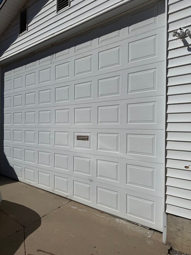 Building Photo - Beautifully updated duplex with parking and a storage shed