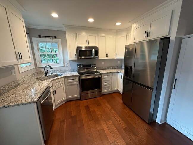 Building Photo - REMODELED 4-BEDROOM HOME W/FENCED YARD