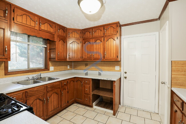 Building Photo - Move in before February 15th and choose your reward: a $250 Amazon Gift Card or a 55" Smart TV!