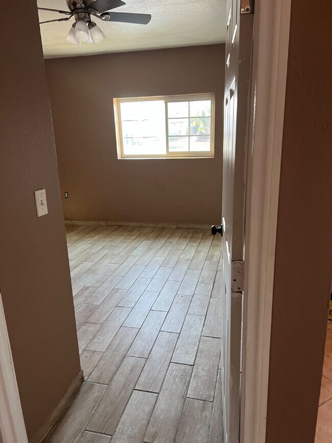 Building Photo - LARGE Lot - Nearly half acre.  Perfect for animals or gardening.  Updated interior, New Gas Range...