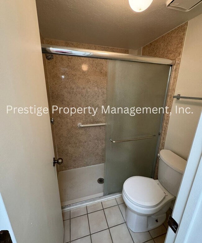 Building Photo - Totaling 3/3 With The Guest House; This Lovely Central Townhome is Everything You Need!