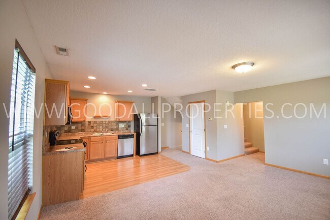 Building Photo - Experience the charm of this 2-bedroom, 2-bathroom townhome in Ankeny with an attached 2 car garage!