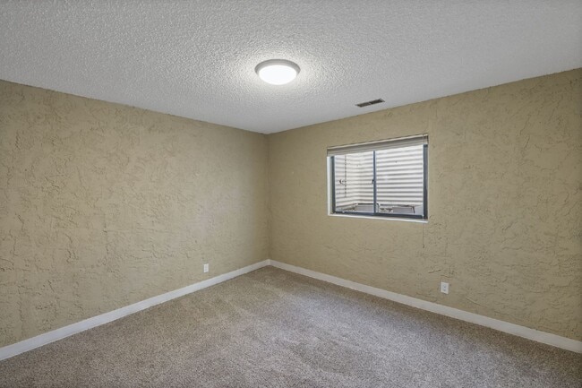 Building Photo - Spacious 4-Bedroom Home with Finished Basement, Large Deck & 2-Car Garage