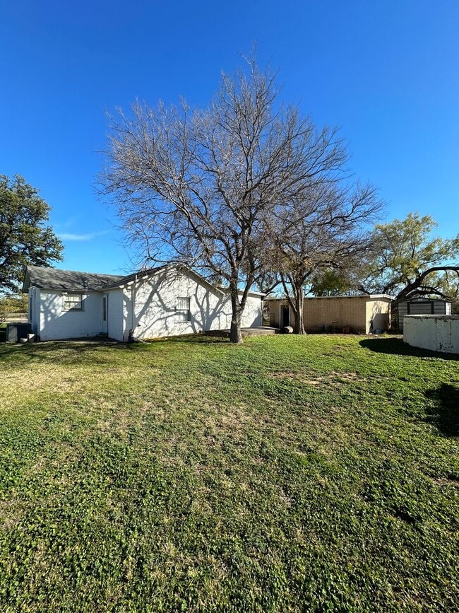 Building Photo - COMING MAY 2026! Charming 4-Bedroom Home + Huge Lot!