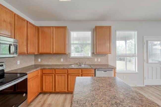 Building Photo - 9104 China Rose Dr