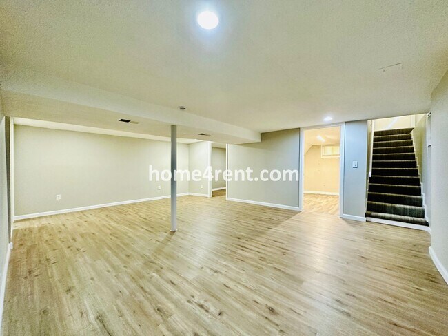 Building Photo - Like New, Ranch Style Home in Raytown - Wood Floors, Finished Basement, Fenced Yard!