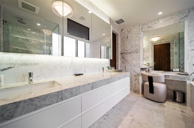 Building Photo - 9701 Collins Ave