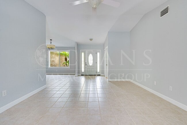 Building Photo - Executive Coastal Retreat | Four-Bedroom P...