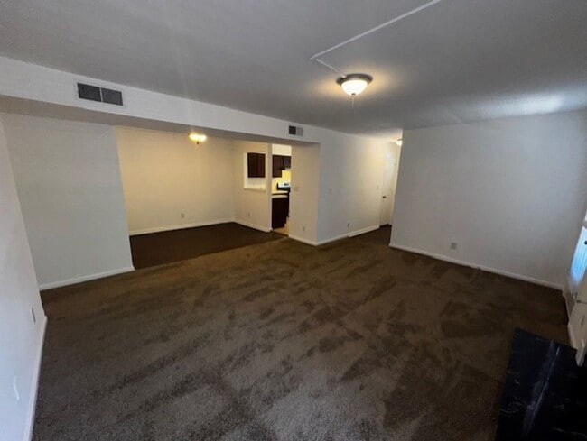 Building Photo - Charming 2-Bedroom Condo in a Peaceful, Tree-Lined Community – Minutes from Uptown Charlotte