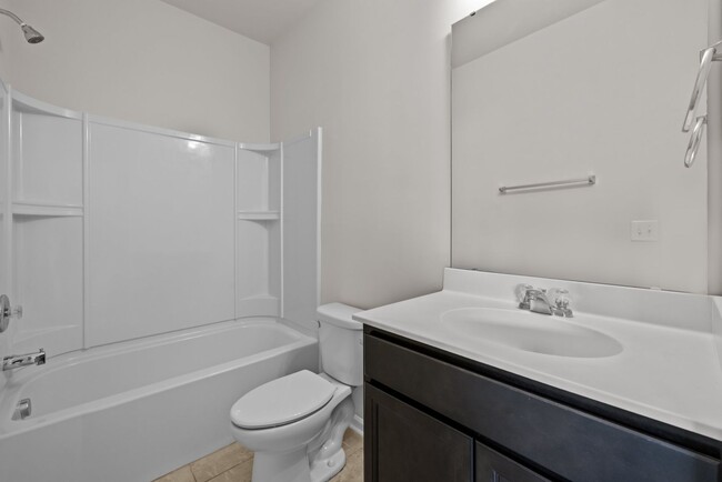 Building Photo - Spacious 5 Bedroom Home with 2-Car Garage,...
