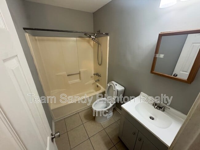 Building Photo - 6823 Tiki Ln