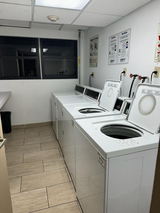 Laundry room across from apartment - 2201 Brickell Ave