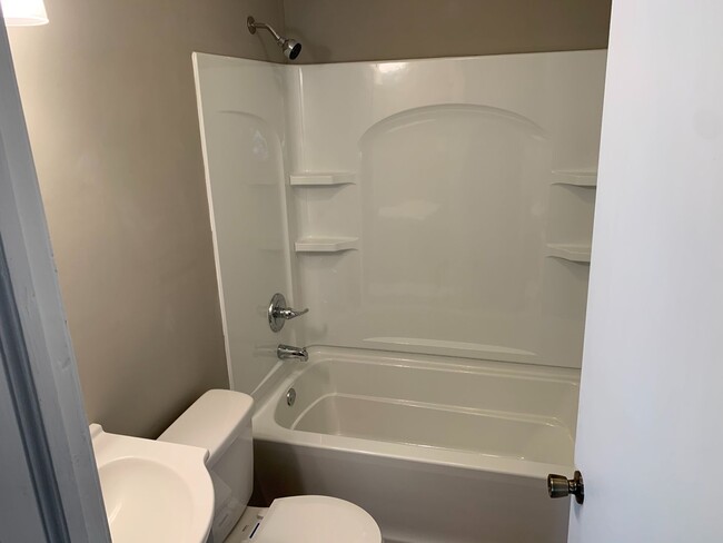 Building Photo - Like New Construction - Premium Finishes T...
