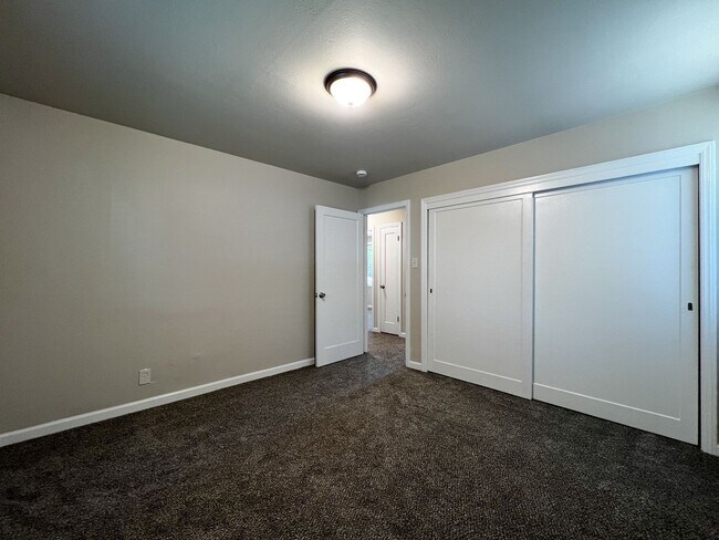 Building Photo - Freshly Renovated 3 Bedroom Home with Large Fenced Yard & Double Garage