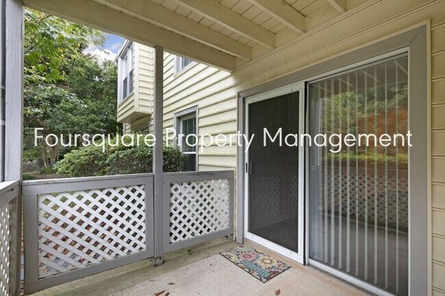 Building Photo - Charming 1st-Floor End-Unit Condo with Gas Log Fireplace, Private Back Porch & Community Pool – T...