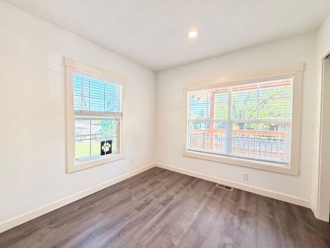 Building Photo - Lovingly Updated Home with Separate Garage, Outdoor Cat Enclosure, Finished Basement, Large Yard,...