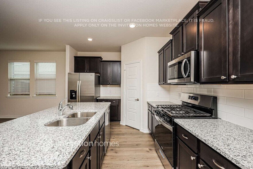 Building Photo - 7408 Mayplace Dr