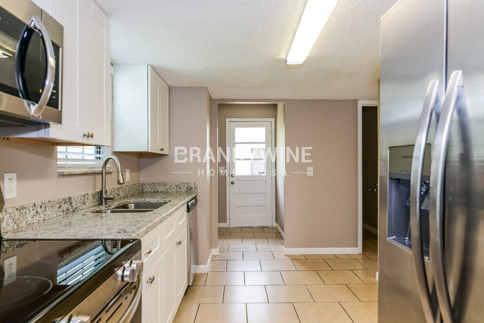 Building Photo - 9319 8th Ave