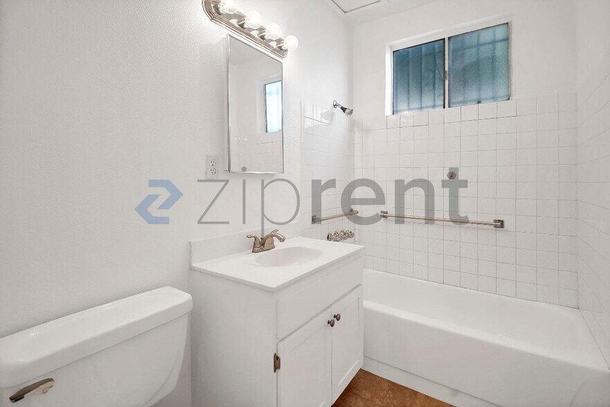 Building Photo - 2458 Normandie Ave