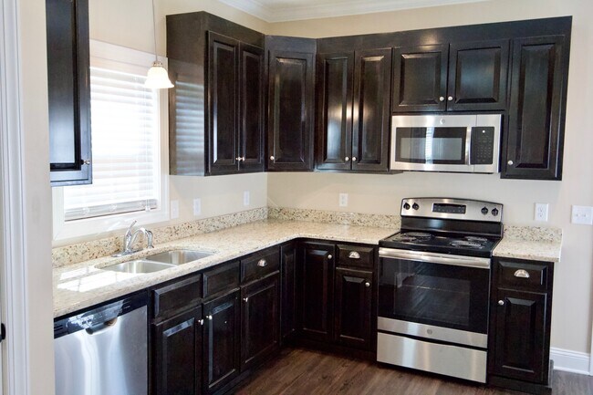 Building Photo - "Brand New Construction."  Quiet location, charming, cozy 3 bedroom duplex