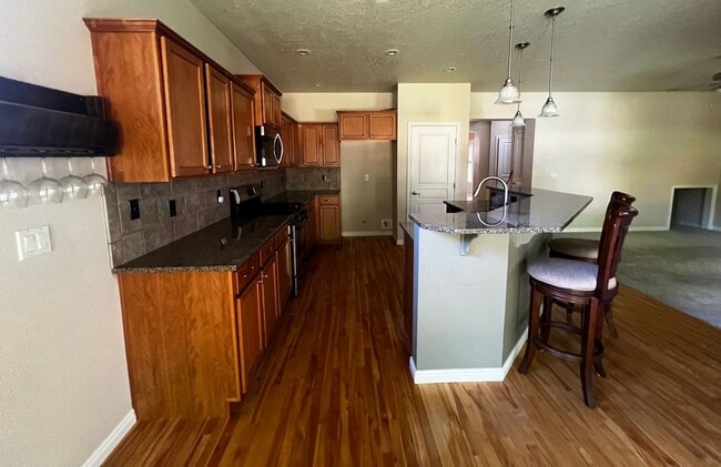 Building Photo - "Luxury Living: Stunning home with marble counter tops & Fireplace!"