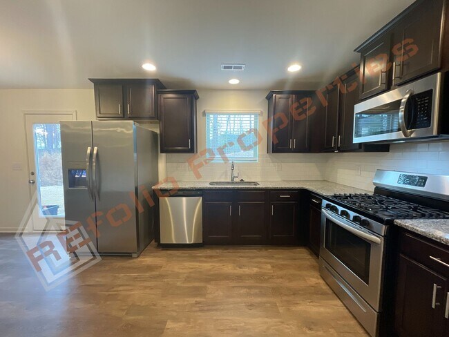 Building Photo - Stylish 4-Bedroom 3 Bathroom Single Home w/ a Guest Suite on the Main Level in Elmwood, Raleigh, ...