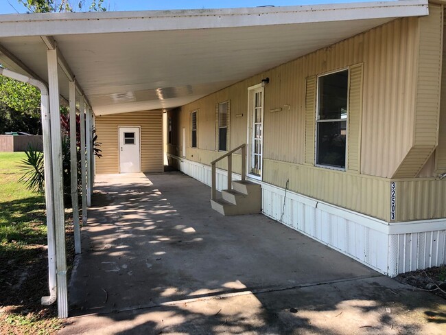 Building Photo - CUTE (2BR/1BA) Wesley Chapel Mobile Home w...