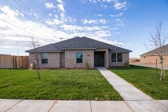 Building Photo - Available with our Lease with Purchase Option Program!