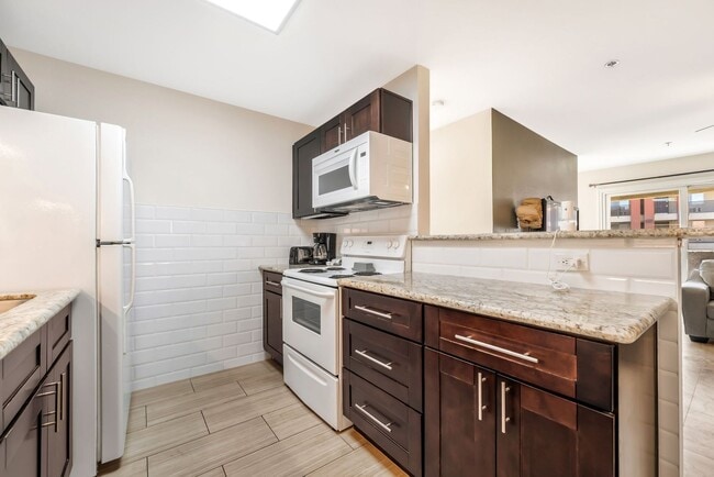 Building Photo - Modern Resort-Style Living in a Beautifully Renovated Gated Community Retreat!