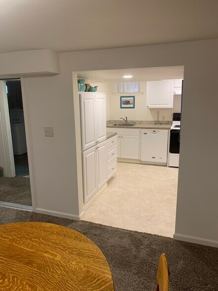 Kitchen from dining room - 103 W 30th Ave