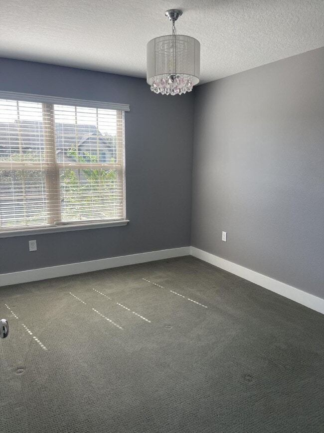 Building Photo - 3/2.5 updated townhome in gated community with 2 car garage