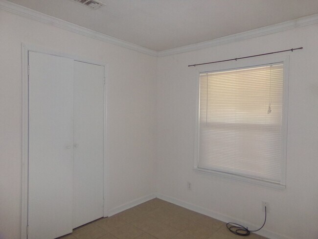 Building Photo - 2BR/1BA Milton Duplex with Huge Fenced Backyard, Tile Flooring Throughout & Convenient Access to ...