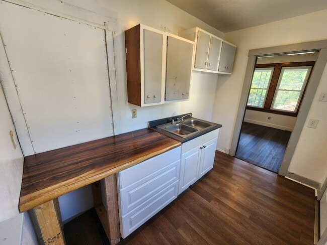 Building Photo - 4 BR home with first-floor living, new roof, and a private-feeling backyard in Lincoln Place