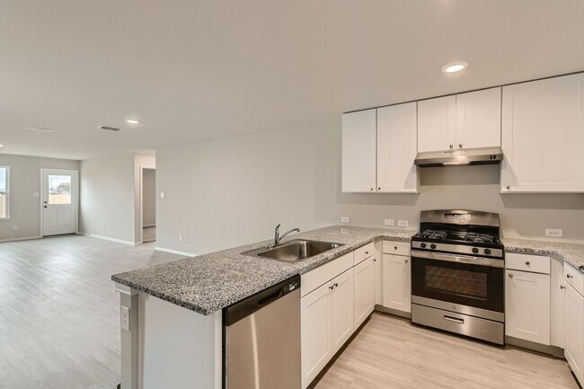 Building Photo - Beautifully Designed4-Bedroom Home with Open-Concept Living in a Prime Location
