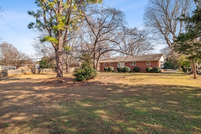 Building Photo - Elon - Large Brick Home, Hardwoods, Granite Counter-Tops, SS Appliances, Fire Place, Carport - Mu...