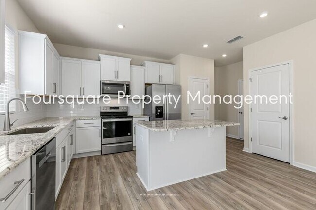 Building Photo - 4 Bedroom Home with 2nd Floor Loft- Kitchen Island & 2-Car Garage – Convenient Raleigh Location