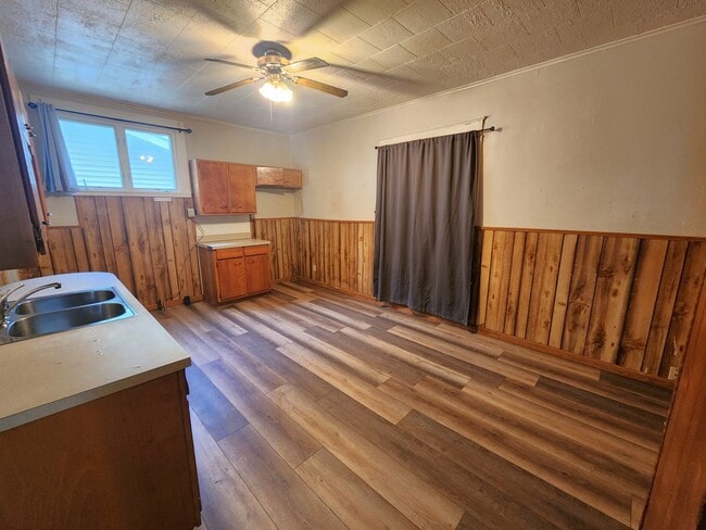 Building Photo - Nice home with oversized 2car gar with work bench and large shaded yard. Country-like setting