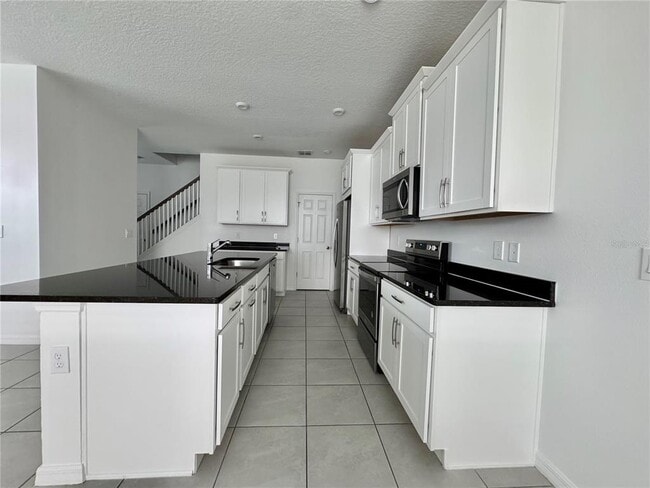 Building Photo - 8973 Matriarca Aly