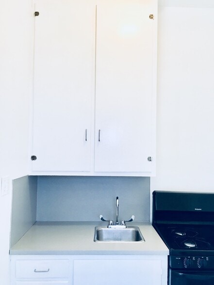 Full Wall Cabinet Storage - 343 College Ave