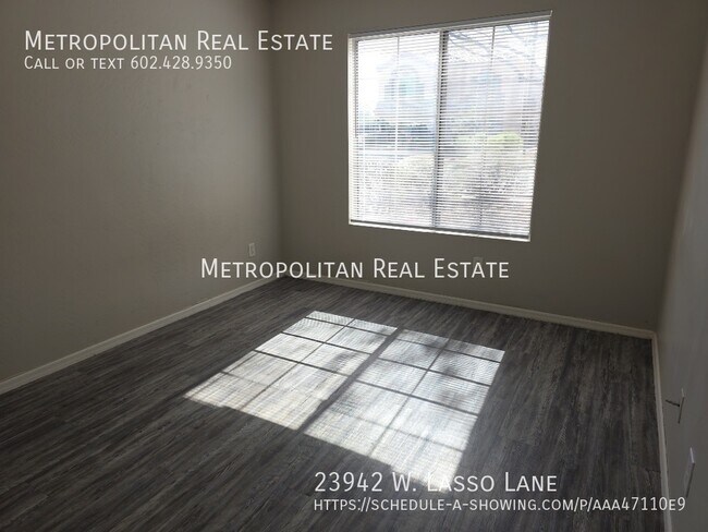 Building Photo - 23942 W Lasso Ln