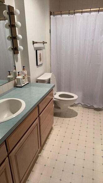 Building Photo - Convenient 2 Bedroom 2 Bathroom Condo Living "In The Trees" with On-Site Amenities