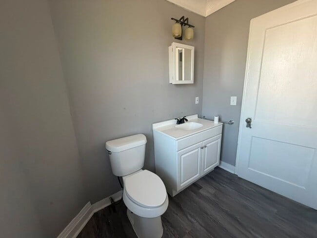 Building Photo - Four bedrooms. A sunroom. A fenced yard. A garage. Your next home is ready to be discovered!