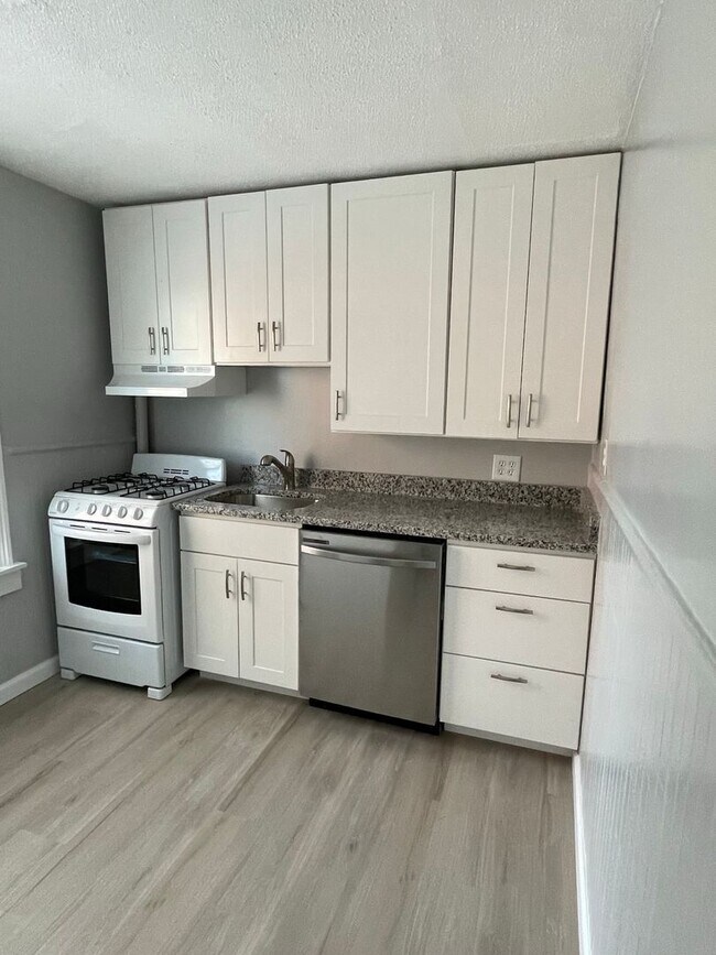 Building Photo - Small pets are welcome with an additional deposit and monthly pet rent.