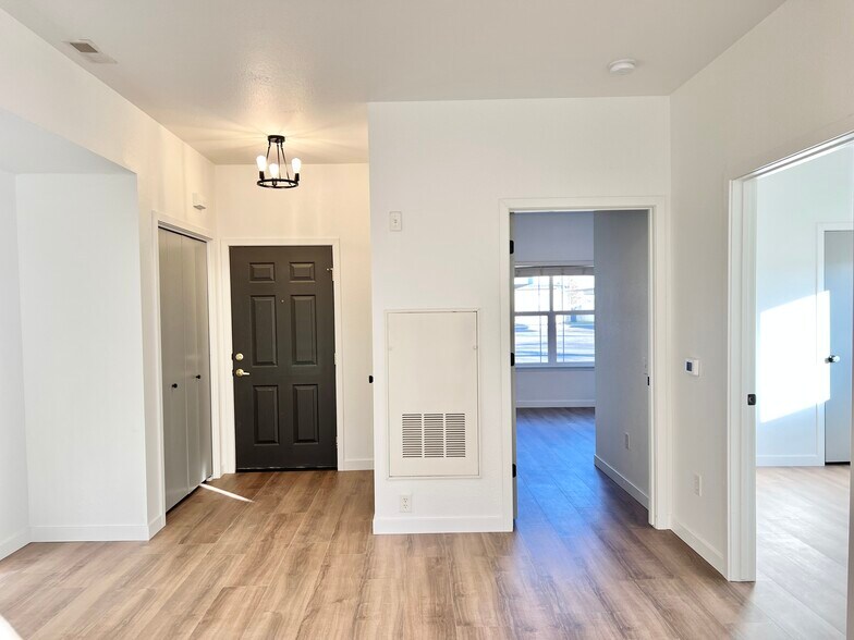 Left to Right: Entrance Closet, Front Door, Bedroom 1, Bedroom 2 (View from Living Room) - 139 N Plummer Rd